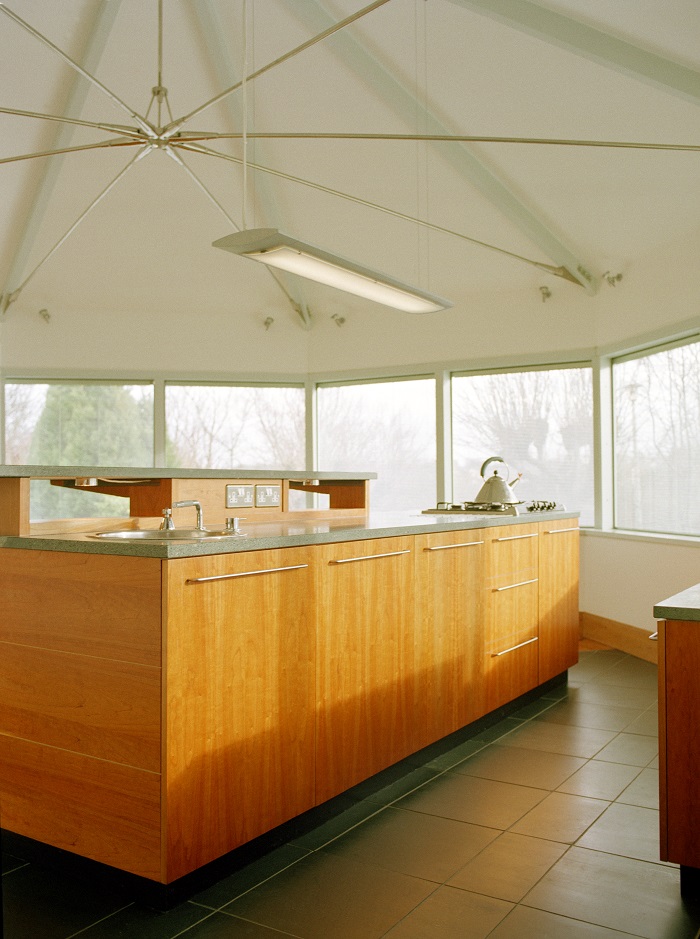 Wooden kitchen design below stainless steel roof tie in Gordon Terrace, Newington, Edinburgh.